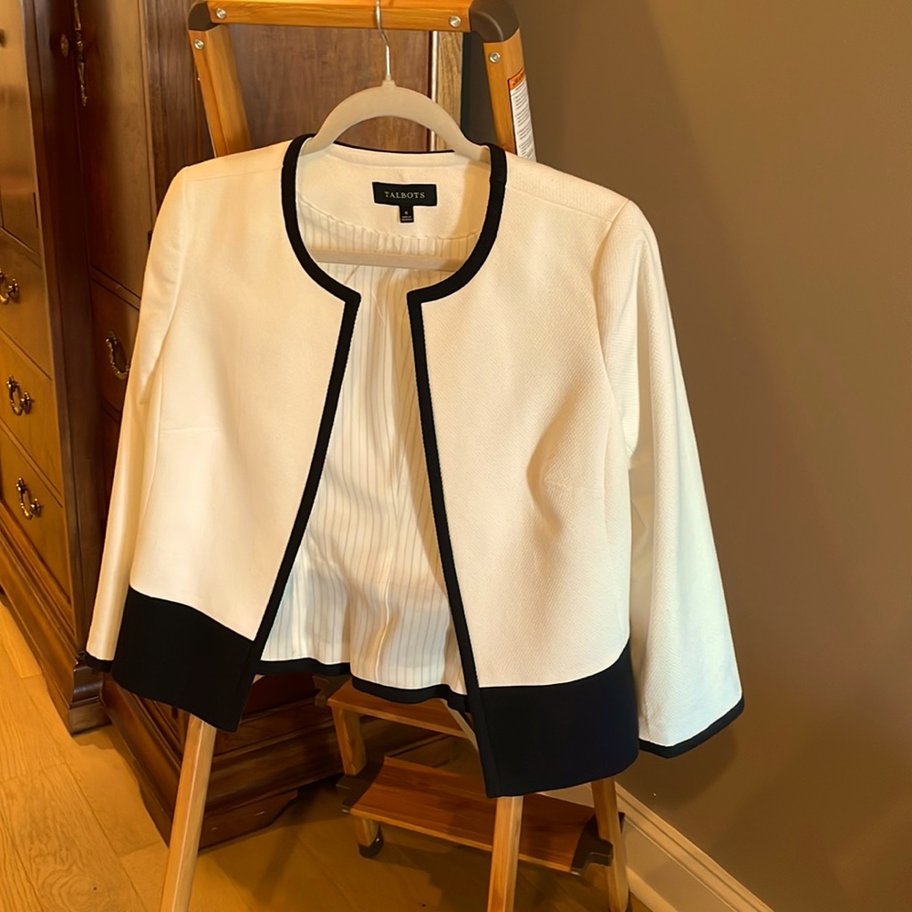 Fully lined black/white jacket. Worn once.